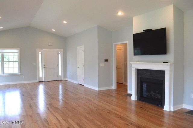 5 Aspen Way Lot 17, Pittsfield, MA 01201 - unfurnished living room featuring recessed lighting, baseboards, vaulted ceiling, and light wood-type flooring