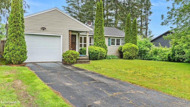 33 Quirico Dr, Pittsfield, MA 01201 - view of front of home with asphalt driveway, an attached garage, a front lawn, and a chimney
