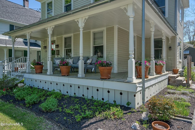 view of property exterior with a porch