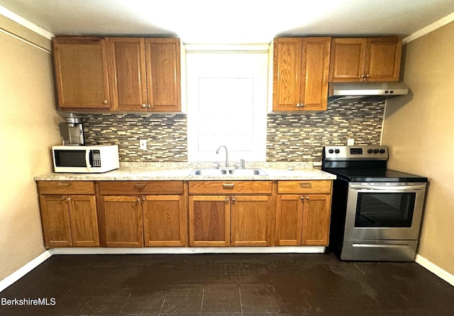 kitchen featuring sink, stainless steel electric range, and backsplash