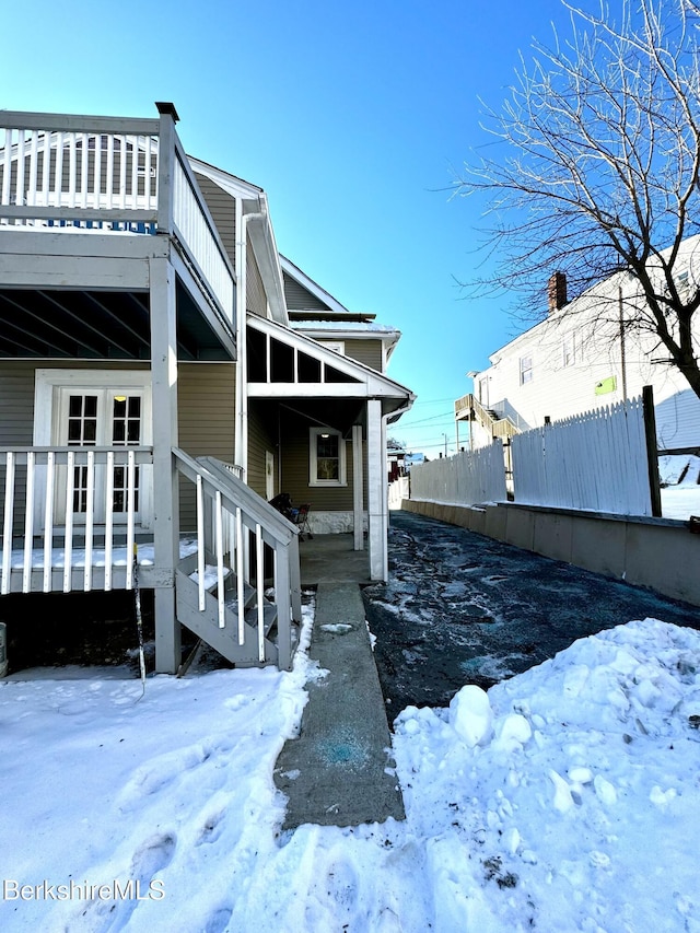 exterior space featuring a wooden deck