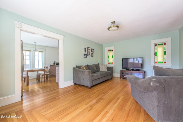 12 Riverfront St, Chester, MA 01011 - living area with light wood-type flooring and baseboards