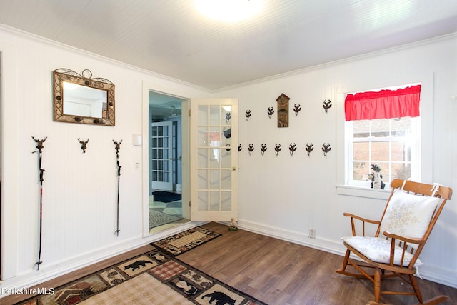 sitting room featuring dark hardwood / wood-style floors and ornamental molding