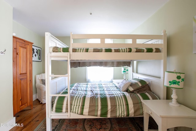 bedroom with wood-type flooring