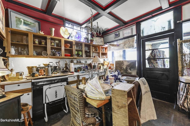 kitchen with beamed ceiling, open shelves, coffered ceiling, and dishwasher