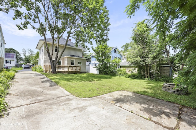 56 Perrine Ave, Pittsfield, MA 01201 - view of green lawn with a patio area and concrete driveway