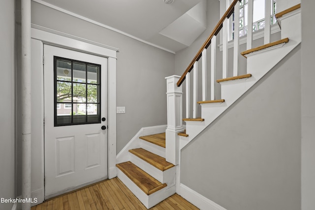 56 Perrine Ave, Pittsfield, MA 01201 - foyer featuring light wood finished floors and stairs