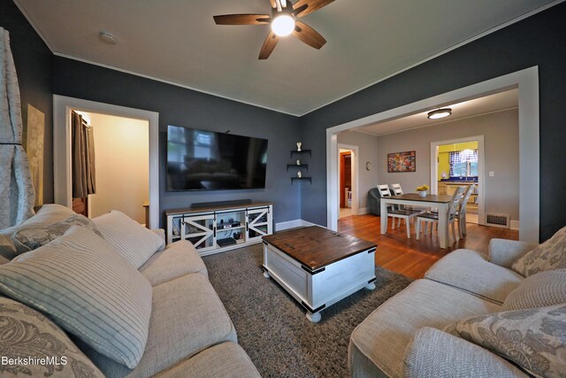 88 Newell St, Pittsfield, MA 01201 - living area featuring ceiling fan, wood finished floors, and crown molding