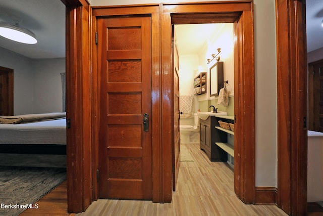 88 Newell St, Pittsfield, MA 01201 - hall with light wood-type flooring and a sink