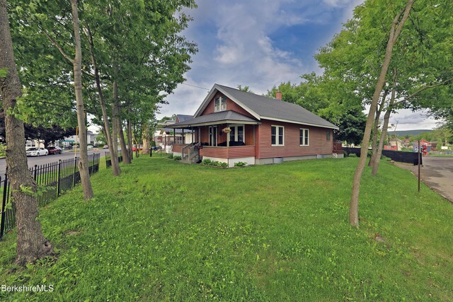 88 Newell St, Pittsfield, MA 01201 - view of side of home with covered porch and a chimney