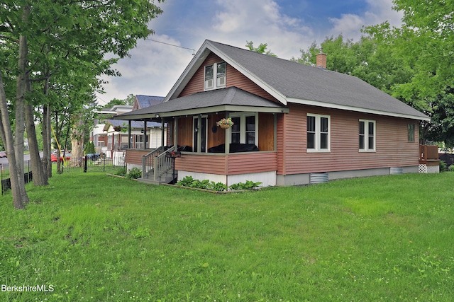88 Newell St, Pittsfield, MA 01201 - back of property featuring covered porch, roof with shingles, and a chimney