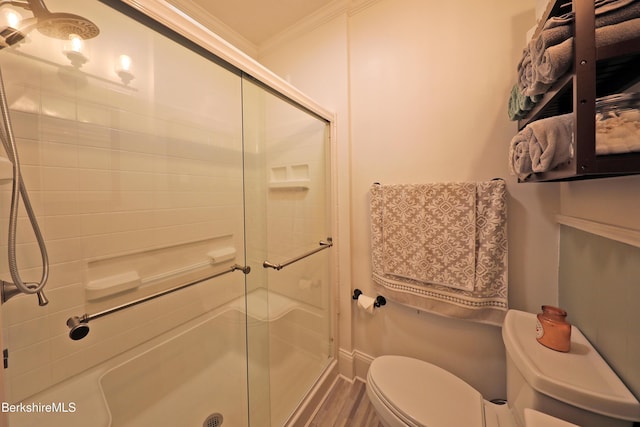 88 Newell St, Pittsfield, MA 01201 - bathroom featuring crown molding, a shower stall, and wood finished floors