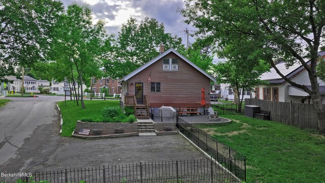 88 Newell St, Pittsfield, MA 01201 - back of house with a chimney