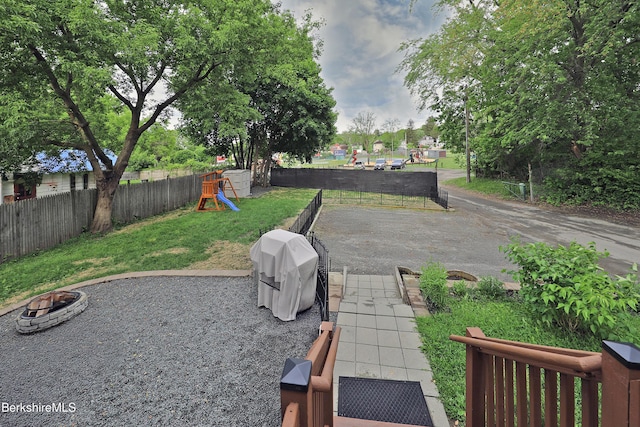 88 Newell St, Pittsfield, MA 01201 - view of yard with a fire pit and a playground