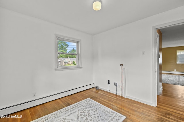 36 Dalton Division Rd, Dalton, MA 01226 - unfurnished room with baseboard heating and wood finished floors