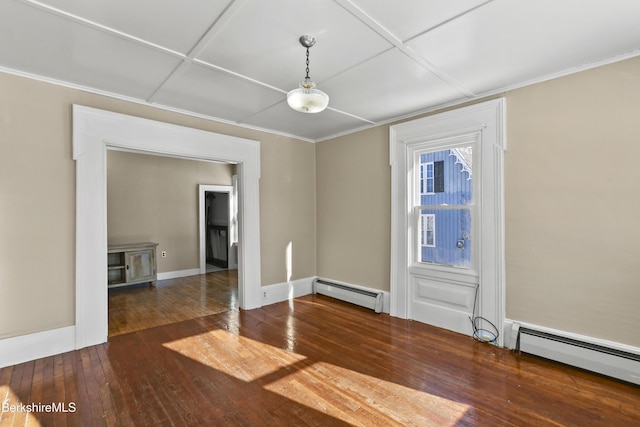 unfurnished dining area with baseboard heating and dark hardwood / wood-style floors