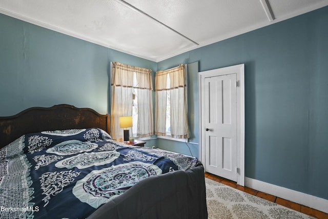 bedroom with tile patterned floors