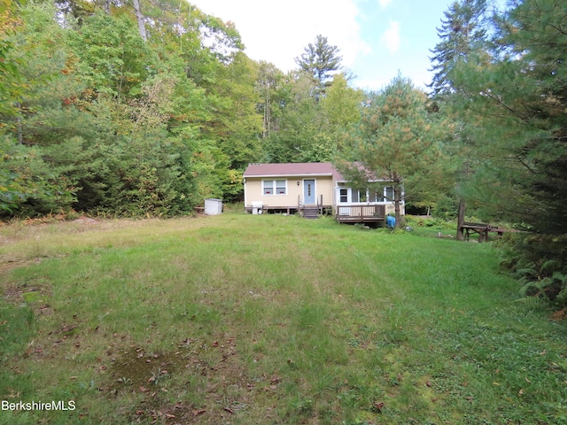 view of yard with a deck