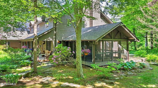 173 Hillsdale Rd, Egremont, MA 01258 - view of side of property featuring a chimney, a sunroom, and roof with shingles