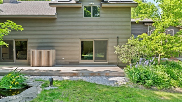 173 Hillsdale Rd, Egremont, MA 01258 - back of property featuring a wooden deck, a lawn, a chimney, and a shingled roof