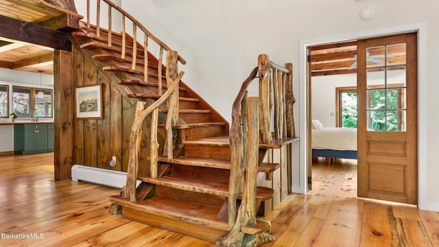 173 Hillsdale Rd, Egremont, MA 01258 - stairway with baseboard heating, wood-type flooring, and beamed ceiling