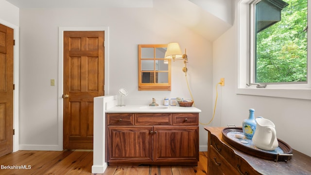 173 Hillsdale Rd, Egremont, MA 01258 - bathroom featuring vanity, wood finished floors, and vaulted ceiling