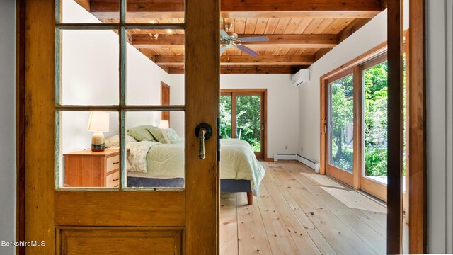 173 Hillsdale Rd, Egremont, MA 01258 - bedroom featuring a wall mounted air conditioner, a wooden ceiling with exposed beams, light wood-type flooring, access to outside, and baseboard heating