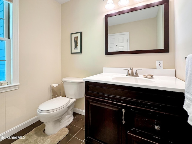 9253 Mountainside Dr, Hancock, MA 01237 - bathroom featuring tile patterned floors, baseboards, vanity, and toilet