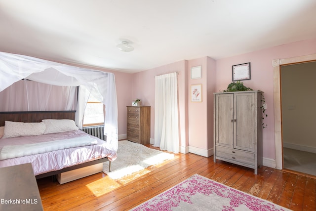 bedroom featuring light wood-type flooring