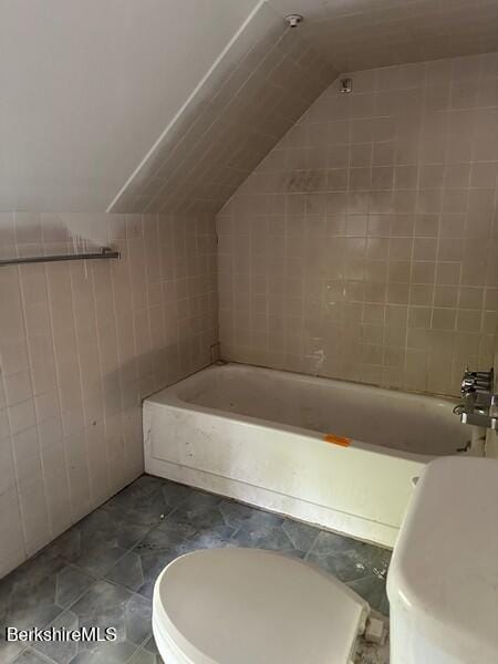 425 Barbour St, North Adams, MA 01247 - bathroom with a tub and lofted ceiling