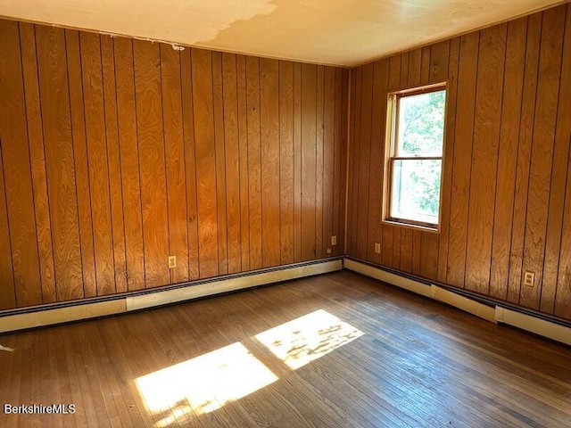 425 Barbour St, North Adams, MA 01247 - unfurnished room featuring hardwood / wood-style flooring and wood walls