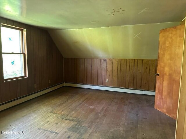 425 Barbour St, North Adams, MA 01247 - bonus room with hardwood / wood-style floors, plenty of natural light, vaulted ceiling, and wooden walls