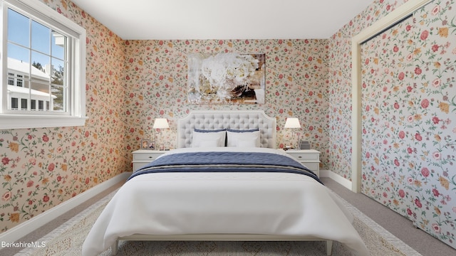 bedroom with baseboards, carpet, and wallpapered walls