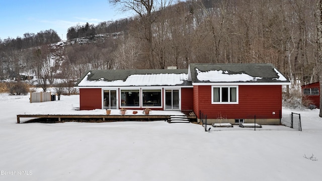 view of snow covered property