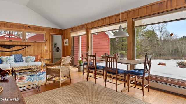 sunroom / solarium with vaulted ceiling