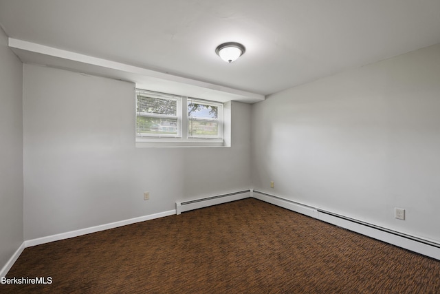 881 Holmes Rd, Pittsfield, MA 01201 - empty room with a baseboard heating unit and baseboards