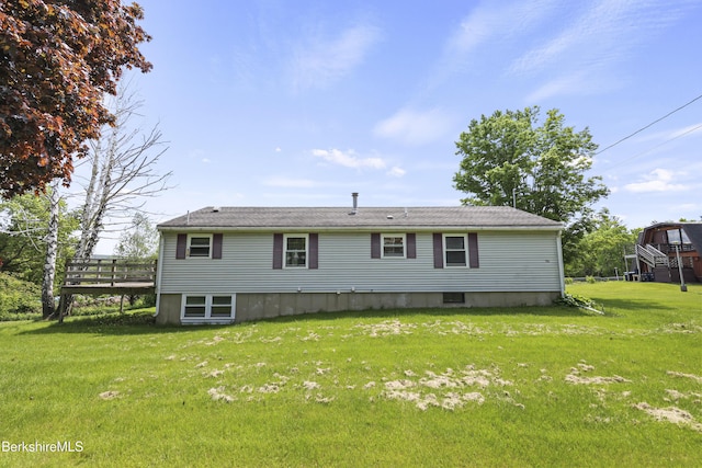 881 Holmes Rd, Pittsfield, MA 01201 - back of property with a lawn and a deck
