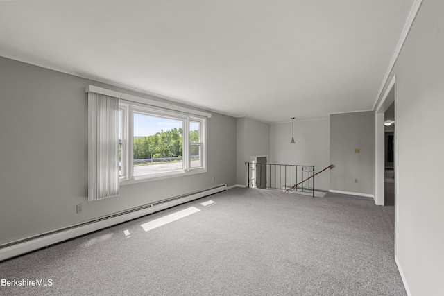 881 Holmes Rd, Pittsfield, MA 01201 - empty room featuring baseboard heating, carpet floors, ornamental molding, and baseboards