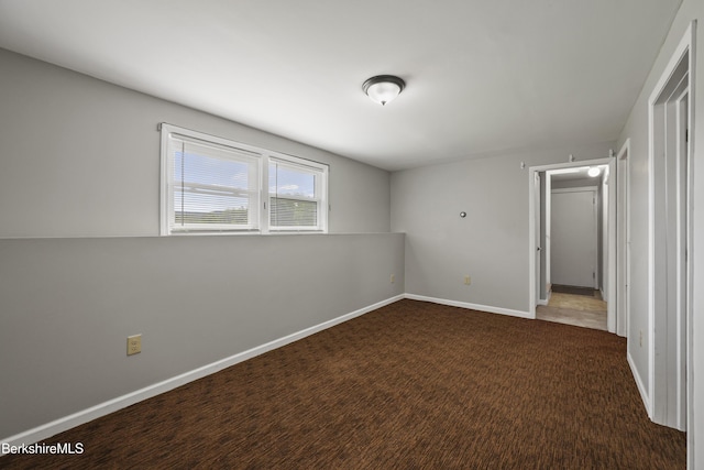 881 Holmes Rd, Pittsfield, MA 01201 - unfurnished bedroom with baseboards and carpet flooring