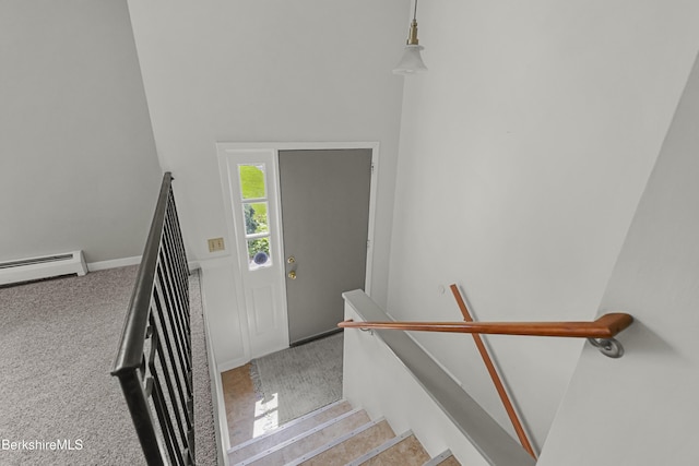 881 Holmes Rd, Pittsfield, MA 01201 - stairway with a baseboard radiator, carpet floors, and baseboards