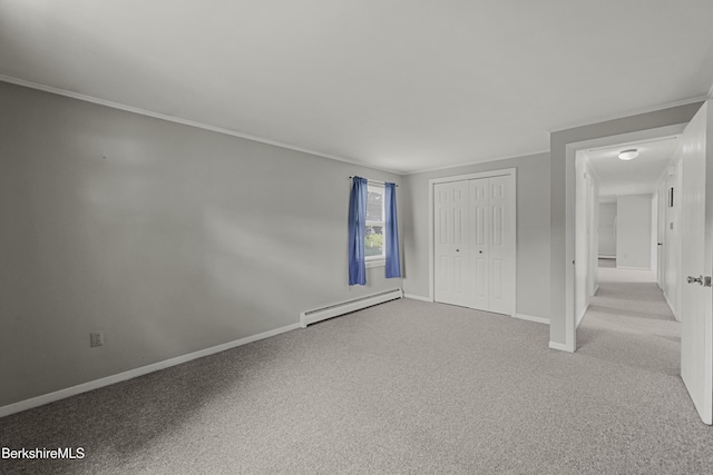 881 Holmes Rd, Pittsfield, MA 01201 - unfurnished bedroom featuring a baseboard heating unit, light carpet, baseboards, a closet, and ornamental molding