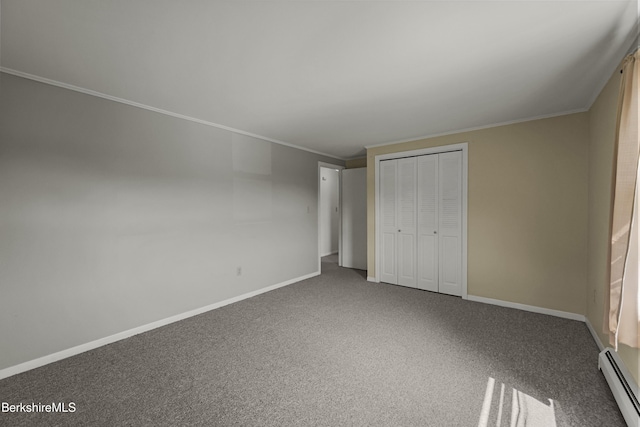 881 Holmes Rd, Pittsfield, MA 01201 - unfurnished bedroom with a baseboard radiator, ornamental molding, a closet, baseboards, and carpet
