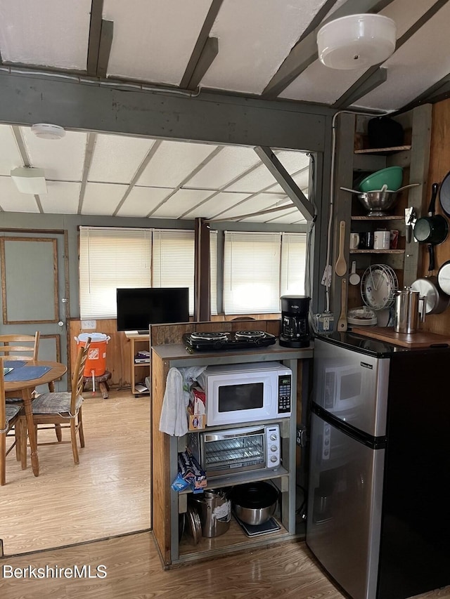 2 Moduc Dr, Heath, MA 01346 - kitchen with freestanding refrigerator, white microwave, and light wood-style flooring