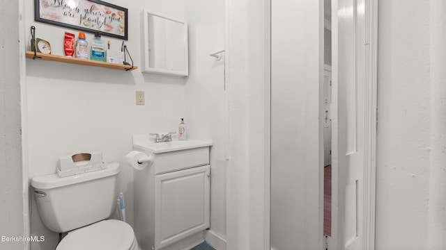 half bath with toilet and vanity