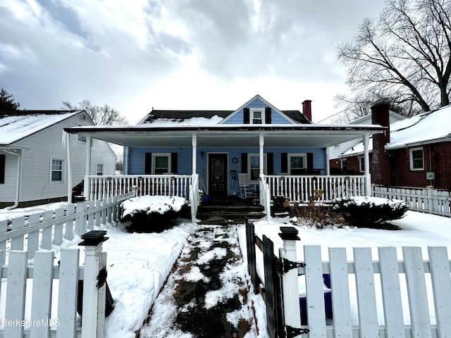 view of snow covered front of house