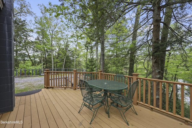 123 Bock Way, New Marlborough, MA 01230 - wooden deck featuring outdoor dining space and view of scattered trees
