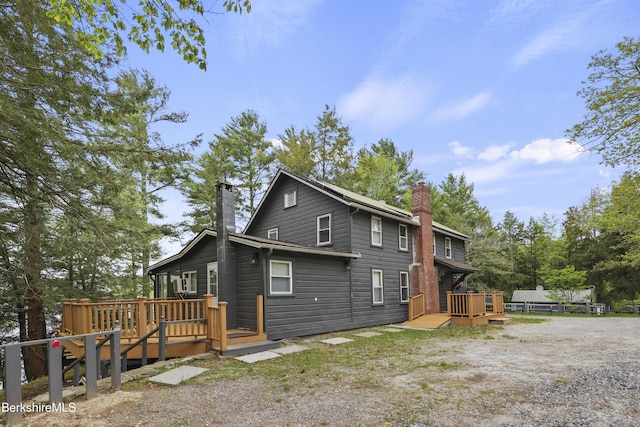 123 Bock Way, New Marlborough, MA 01230 - view of property exterior featuring a chimney and a wooden deck