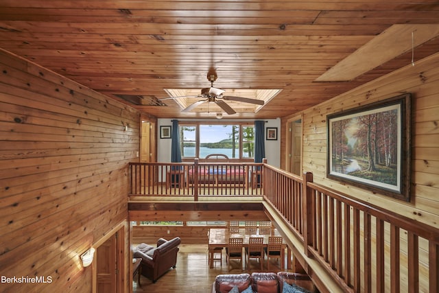 123 Bock Way, New Marlborough, MA 01230 - hall featuring wooden walls, a skylight, wood ceiling, a water view, and hardwood / wood-style floors