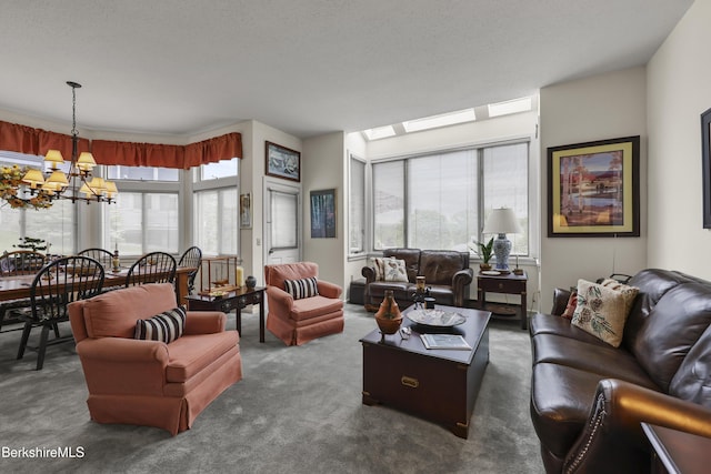 770 Summer St Unit 3A, Lee, MA 01238 - carpeted living room featuring a chandelier