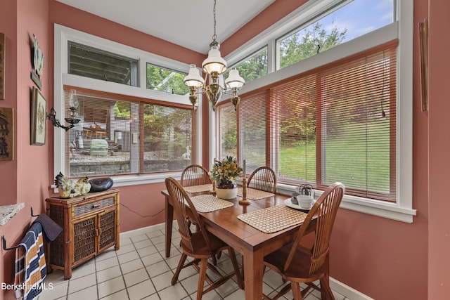 770 Summer St Unit 3A, Lee, MA 01238 - dining room with baseboards, a chandelier, and light tile patterned flooring